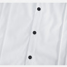 Close-up white shirt with black buttons and vertical pintuck stitching detail | Chaps London