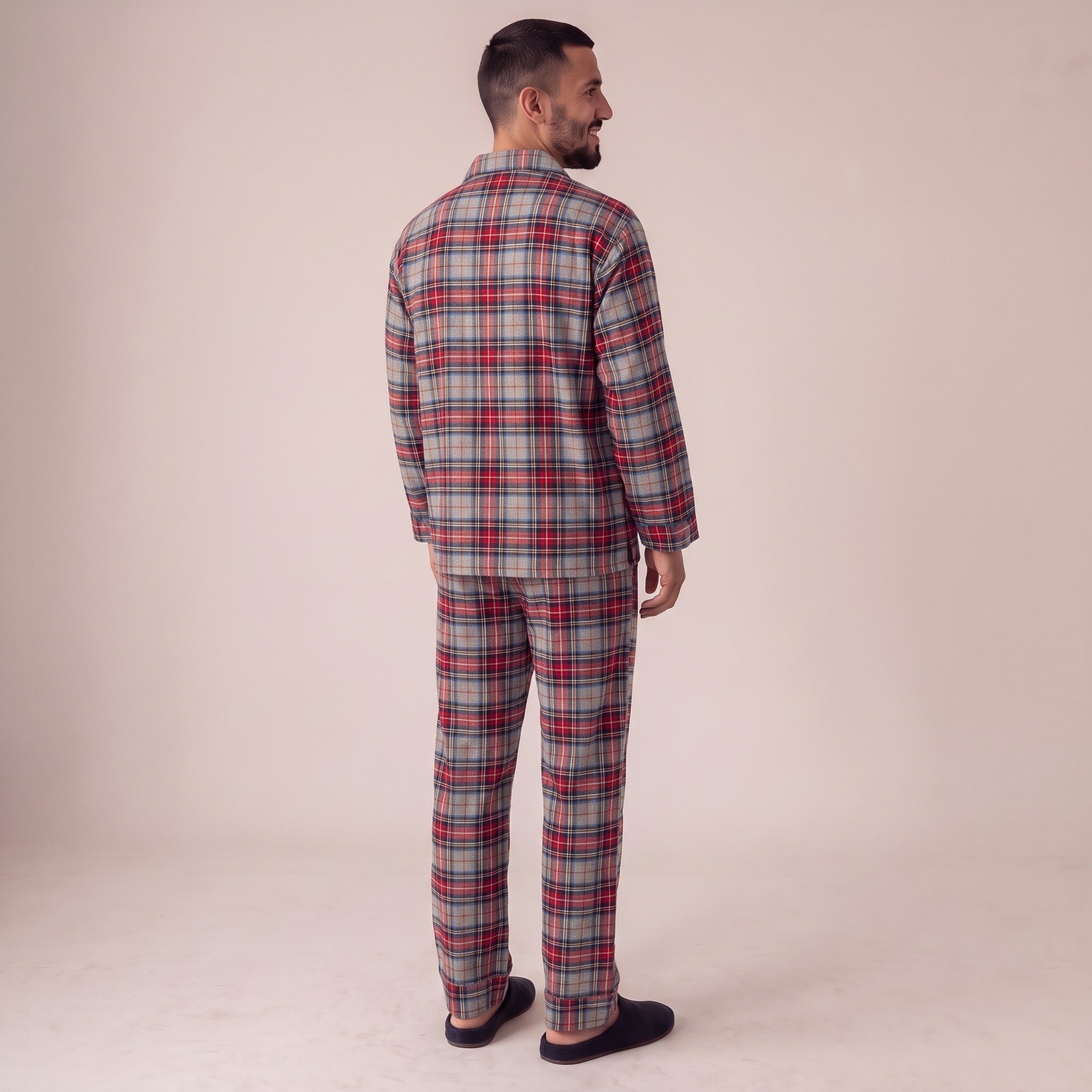 Man wearing red and grey tartan check flannel pyjama set, rear view | Chaps London