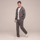 Man wearing dark grey zip hoodie and matching jogger sweatpants outfit | Chaps London