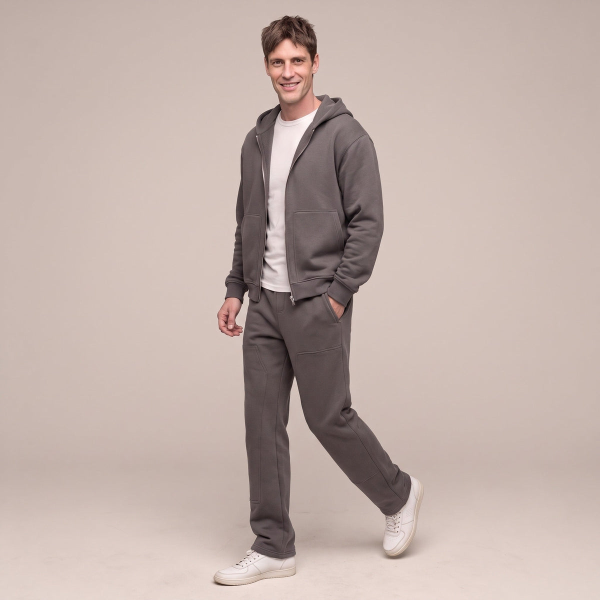 Man wearing dark grey zip hoodie and matching jogger sweatpants outfit | Chaps London