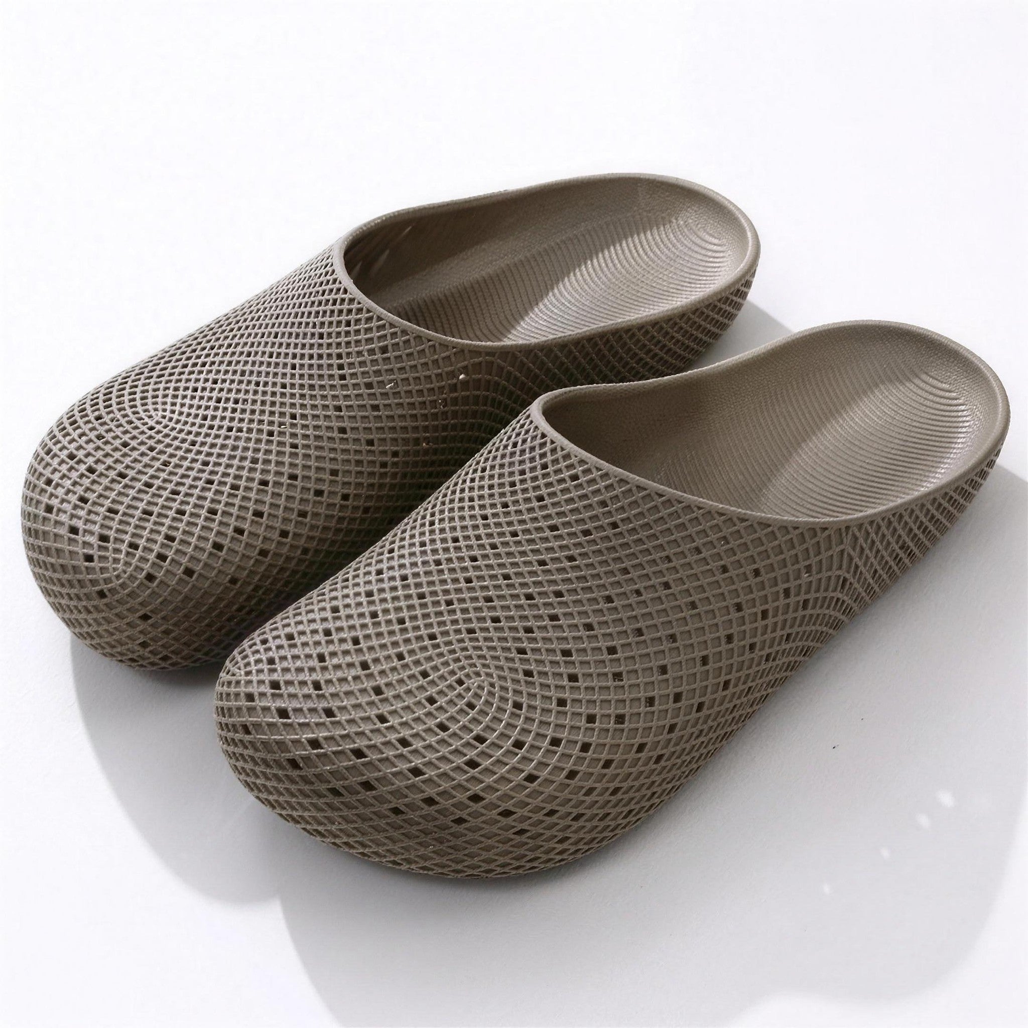 Taupe perforated slip-on garden clogs with textured mesh pattern, shown as pair | Chaps London