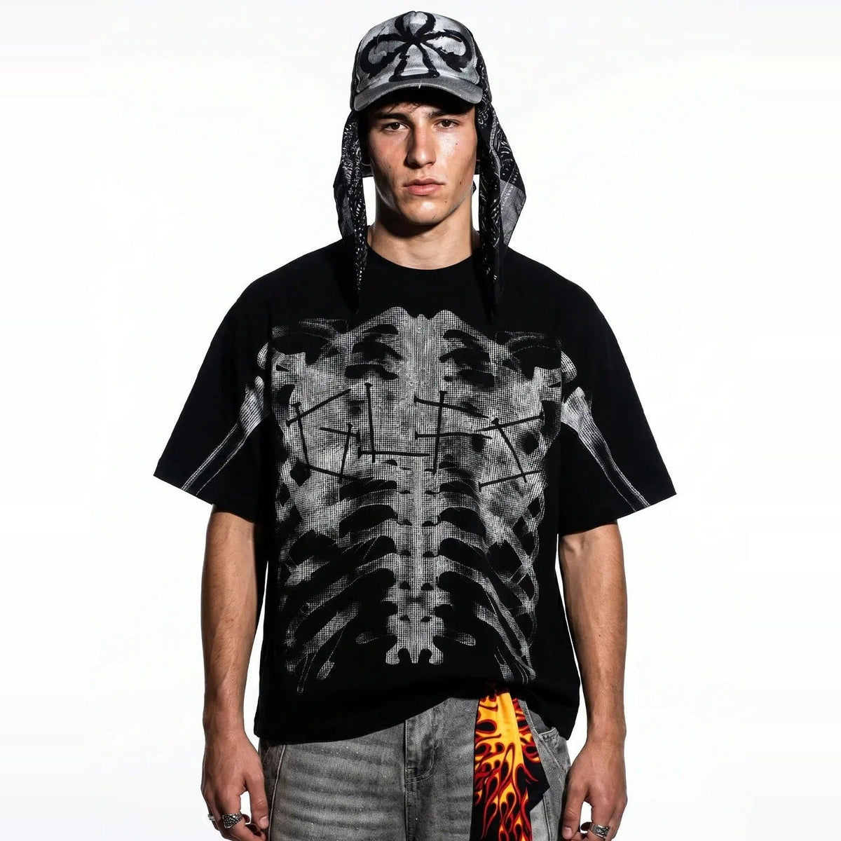 Black oversized T-shirt with X-ray skeleton print, worn by male model | Chaps London