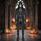 Man wearing black hooded open-front cardigan with leather-look pants in gothic setting | Chaps London