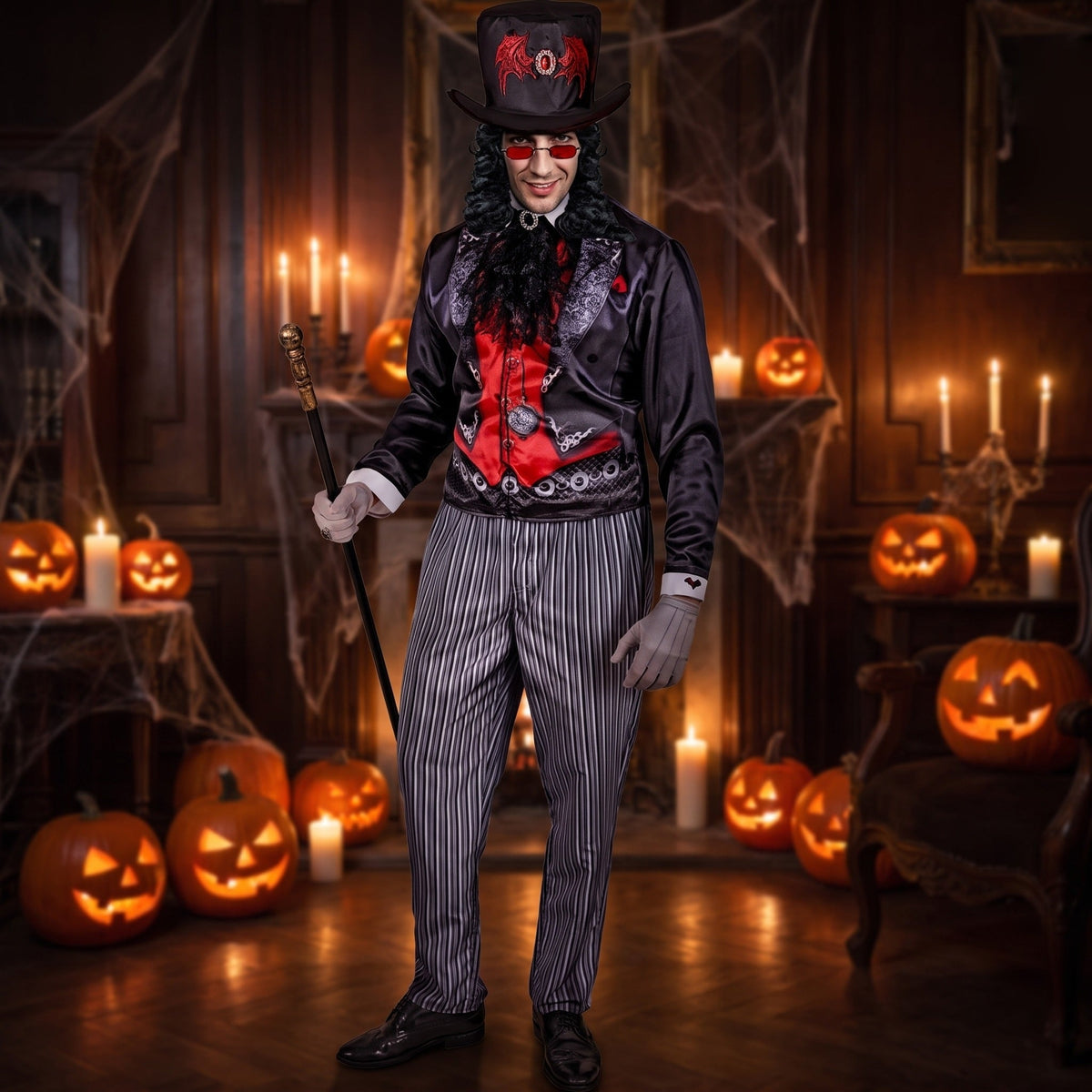 Man wearing black red vampire tailcoat, top hat, pinstripe trousers, holding cane | Chaps London