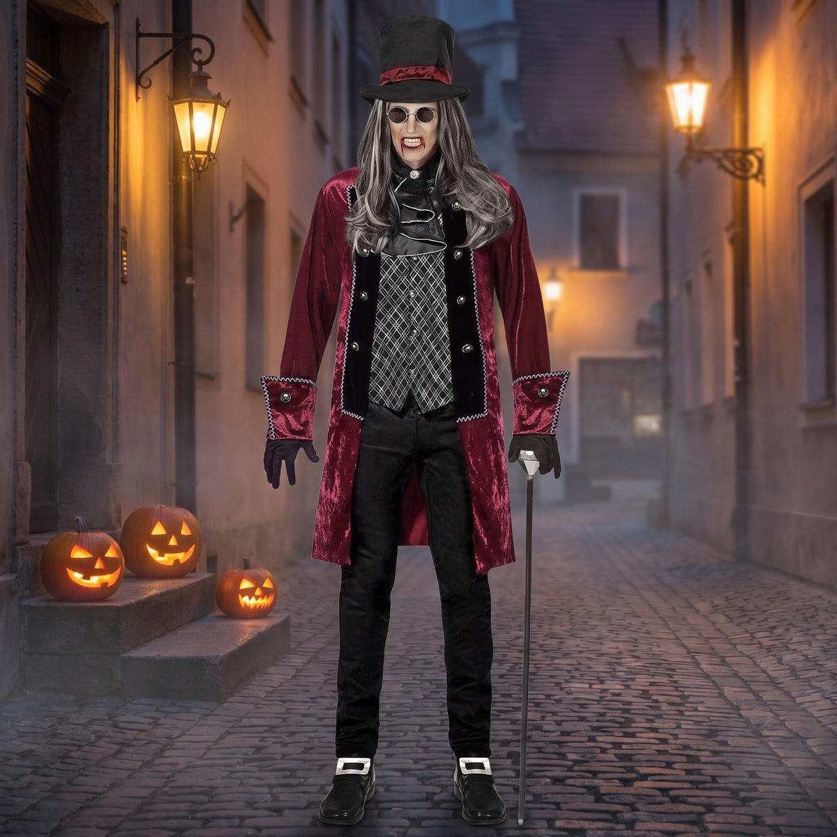 Man wearing burgundy velvet vampire coat, top hat, and striped vest costume | Chaps London