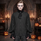 Man wearing black embroidered gothic shirt with lace cravat and brooch | Chaps London