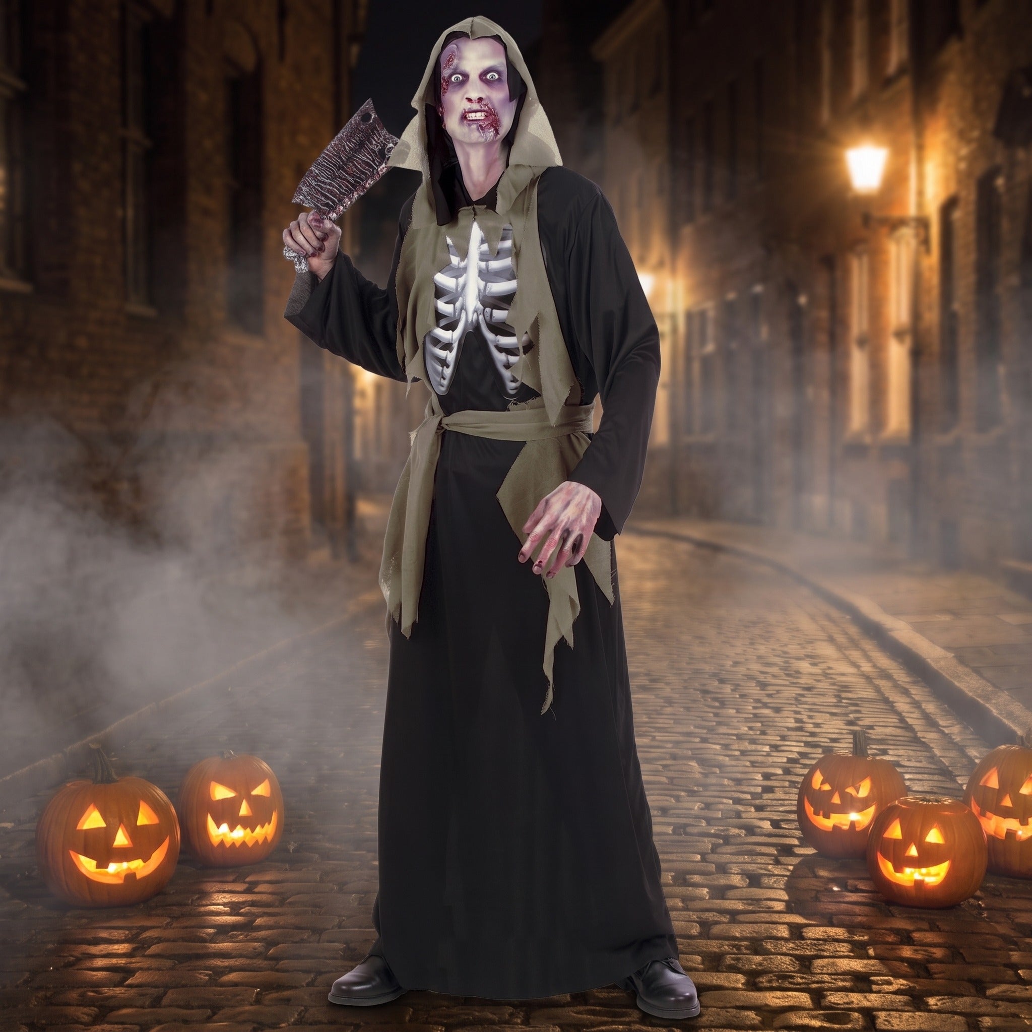 Man wearing black hooded zombie robe with skeleton print, holding prop, outdoor setting | Chaps London