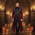 Man wearing burgundy devil tailcoat with horns, cravat, holding cane among pumpkins | Chaps London