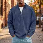 Man wearing navy blue ribbed knit half zip sweater outdoors | Chaps London