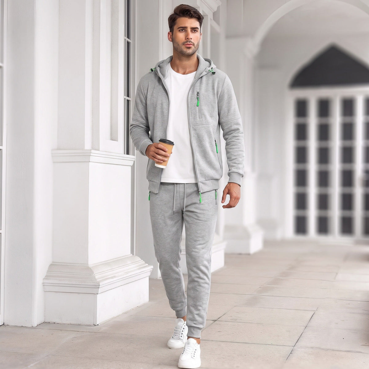 Man wearing grey zip hoodie and matching jogger tracksuit outdoors | Chaps London