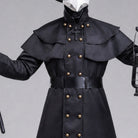 Black belted military-style coat with cape layers and cross detail, worn by mannequin | Chaps London