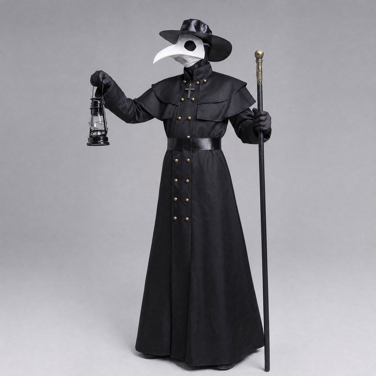 Black plague doctor costume with beak mask, hat, and cane, worn by model | Chaps London