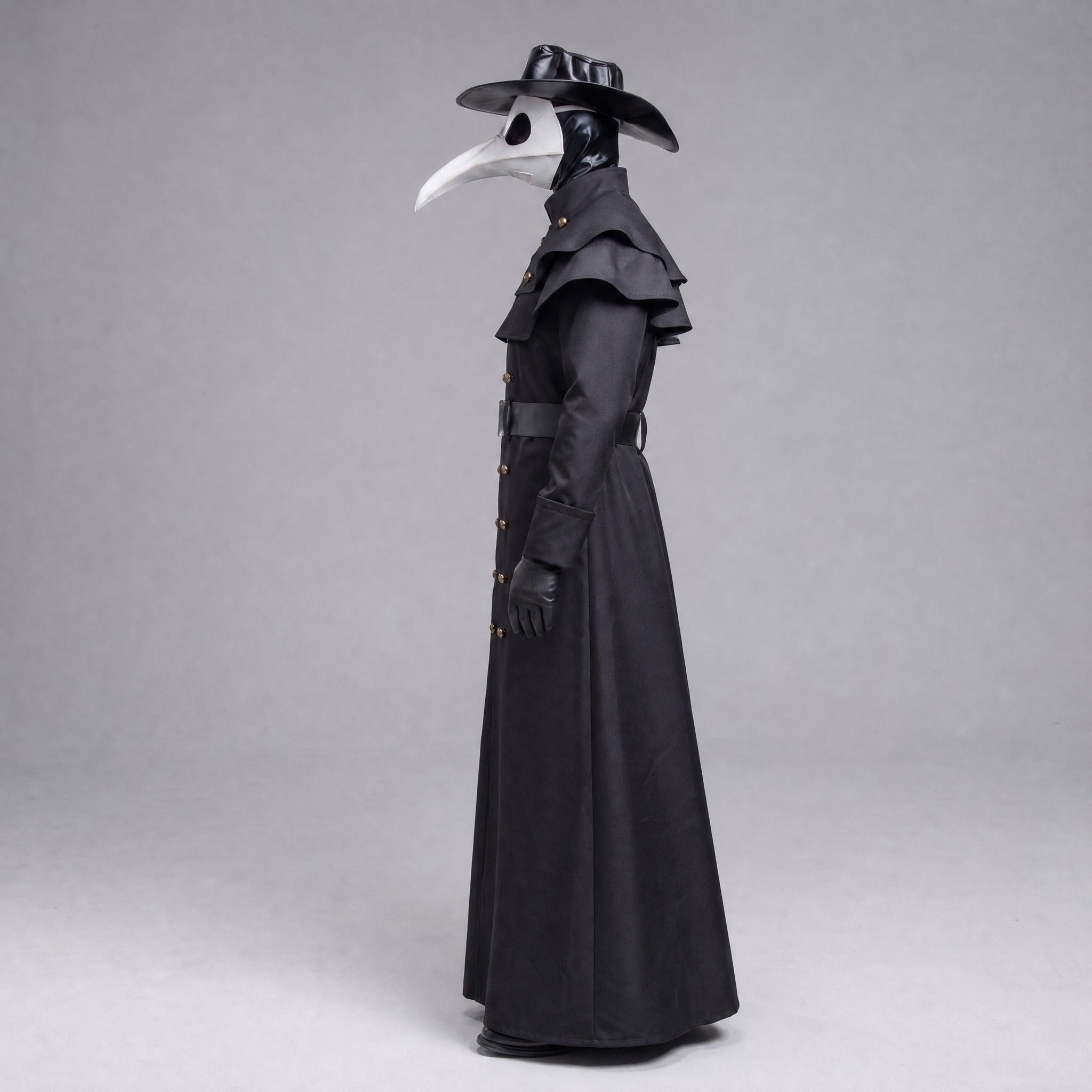 Black plague doctor costume with beak mask, hat, and belted coat on mannequin | Chaps London