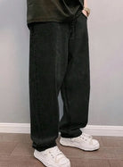 Men's baggy stonewash jeans with a wide leg in black