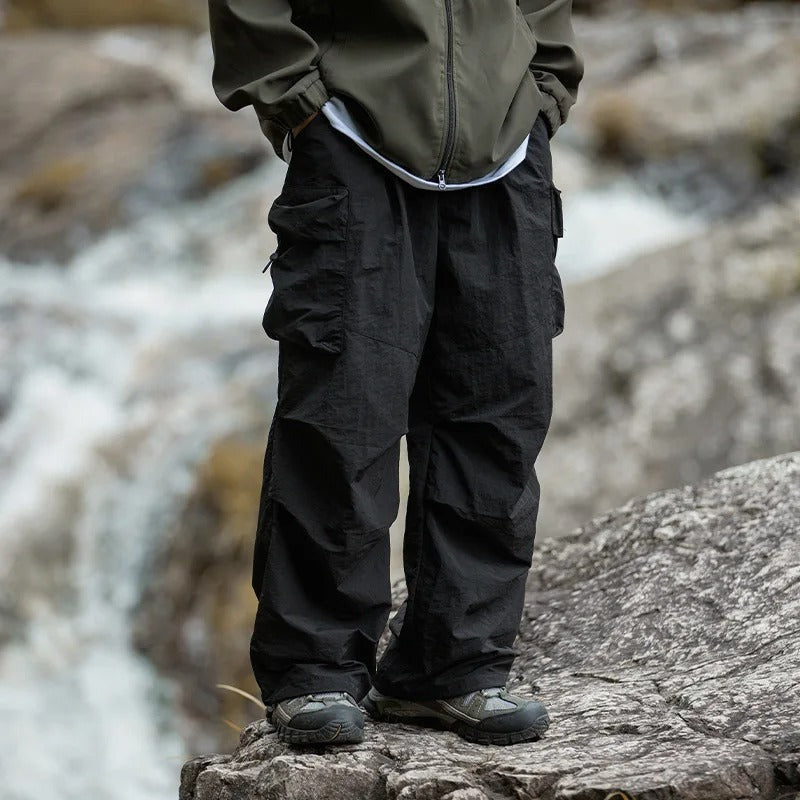 Men's baggy parachute cargo trousers in black