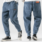 Front and back view of the blue corduroy trousers with elasticated cuffs