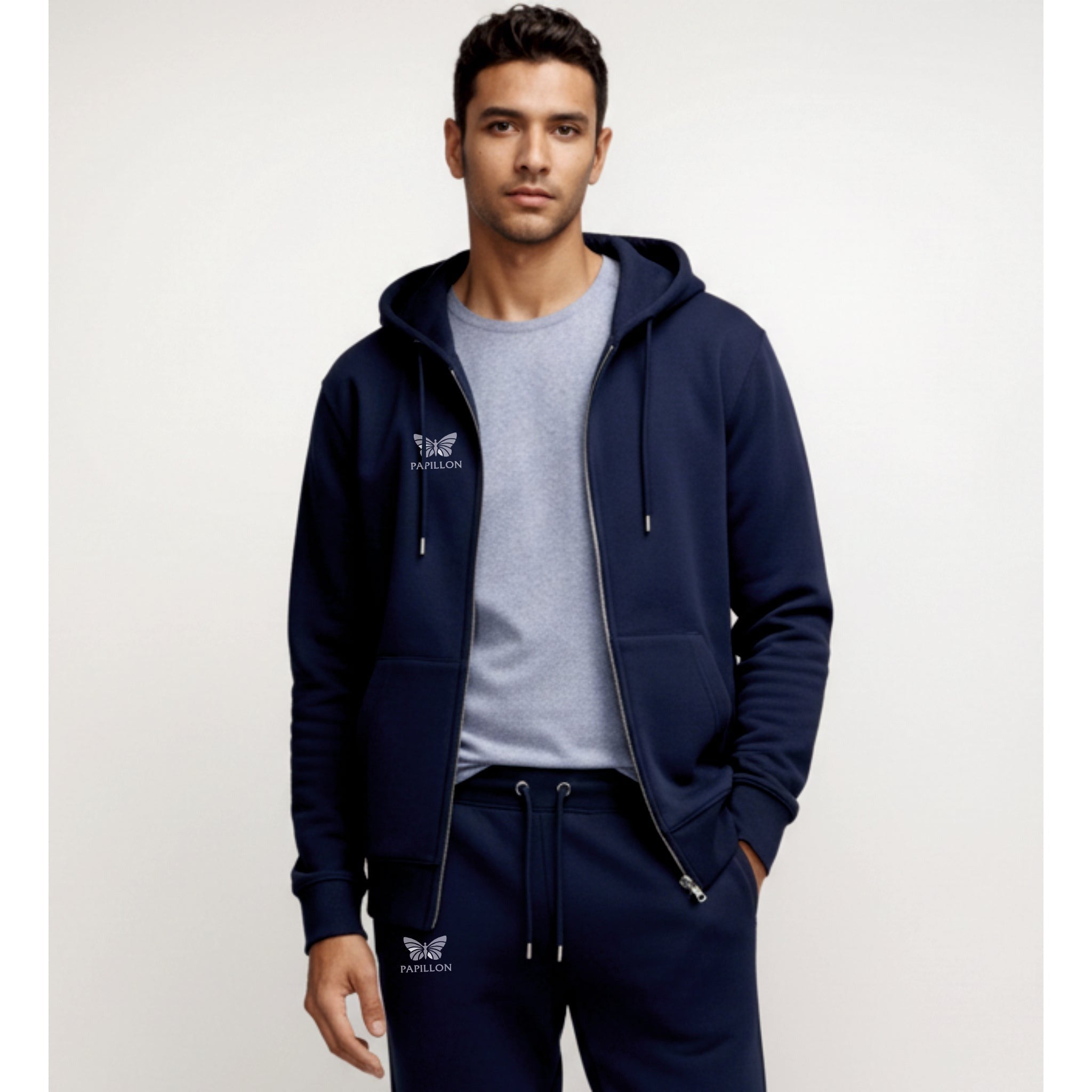 Man in the open navy zip hoodie over a grey T-shirt, with matching joggers | Chaps London