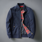 Navy Harrington jacket with a red tartan lining