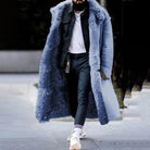 Man wearing long blue faux fur lined coat with wide collar outdoors | Chaps London