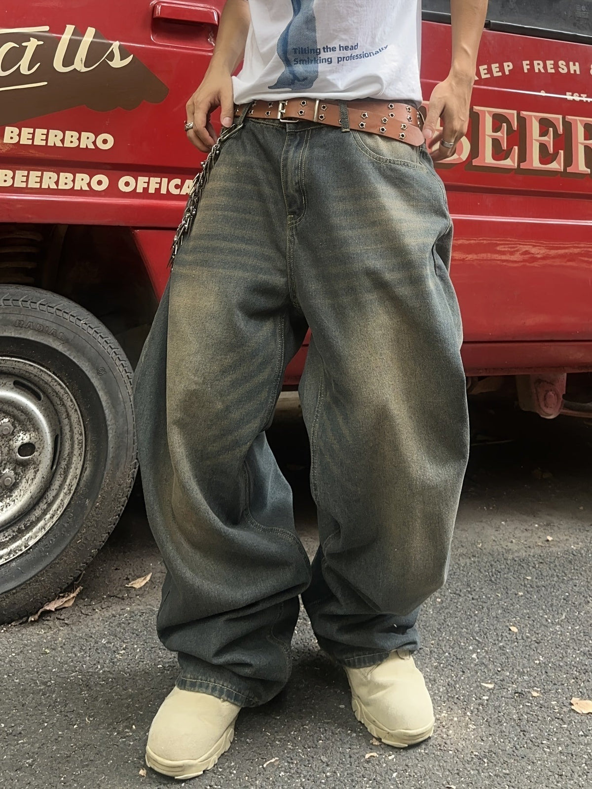 Men's loose fit baggy jeans in a vintage wash, front view
