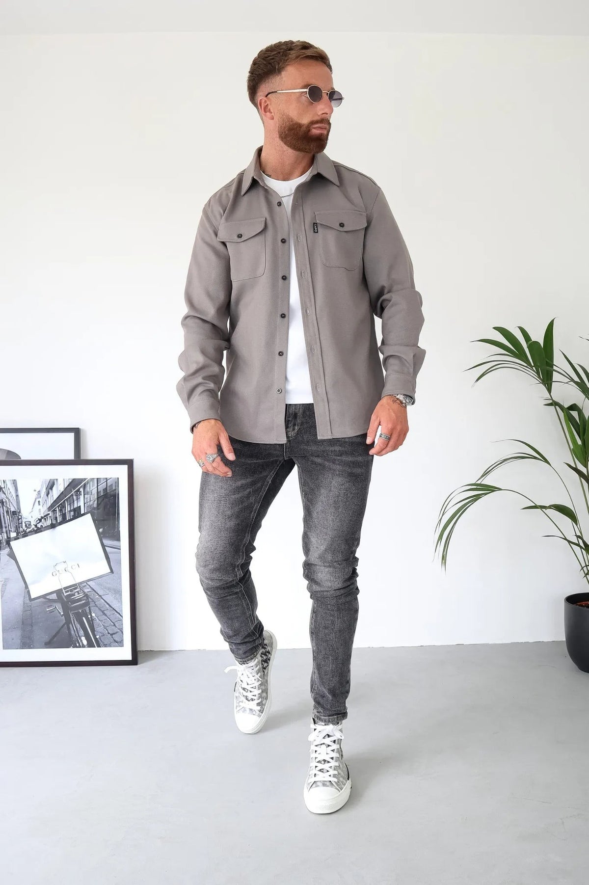 Men's grey button-up overshirt with chest pockets