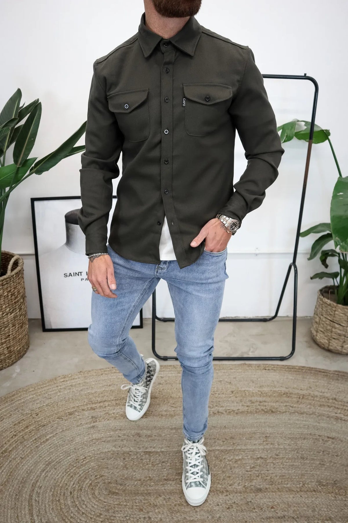 Men's olive button-up overshirt with chest pockets