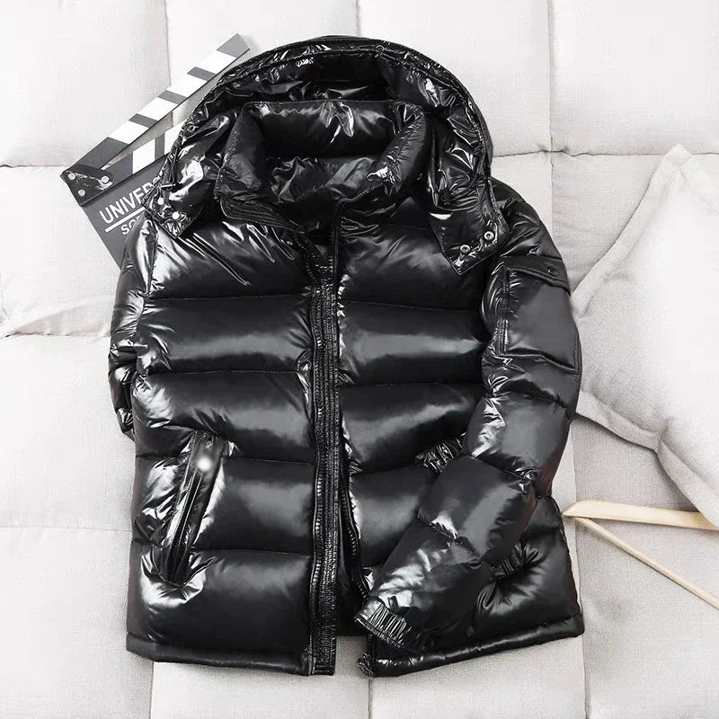 Black shiny puffer jacket with hood, laid flat, quilted texture | Chaps London