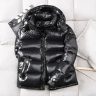 Black shiny puffer jacket with hood, laid flat, quilted texture | Chaps London