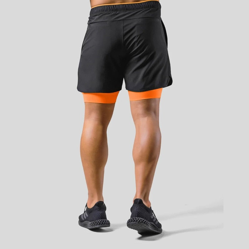 Black and orange 2-in-1 running shorts, back view