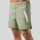 Green 2-in-1 running shorts with a logo print