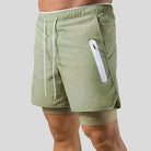 Green 2-in-1 running shorts with a white zip pocket