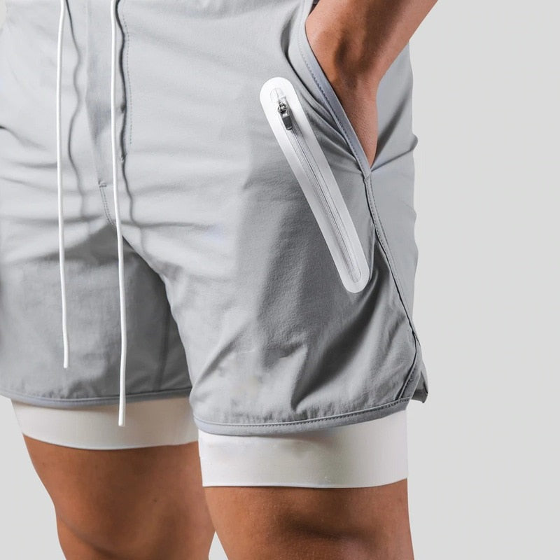 Grey 2-in-1 running shorts with a white zip pocket