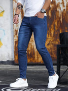 Men's blue skinny jeans, hand in pocket