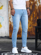 Men's light blue skinny jeans, front view