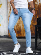 Stretch shown at the hip of the light blue skinny jeans