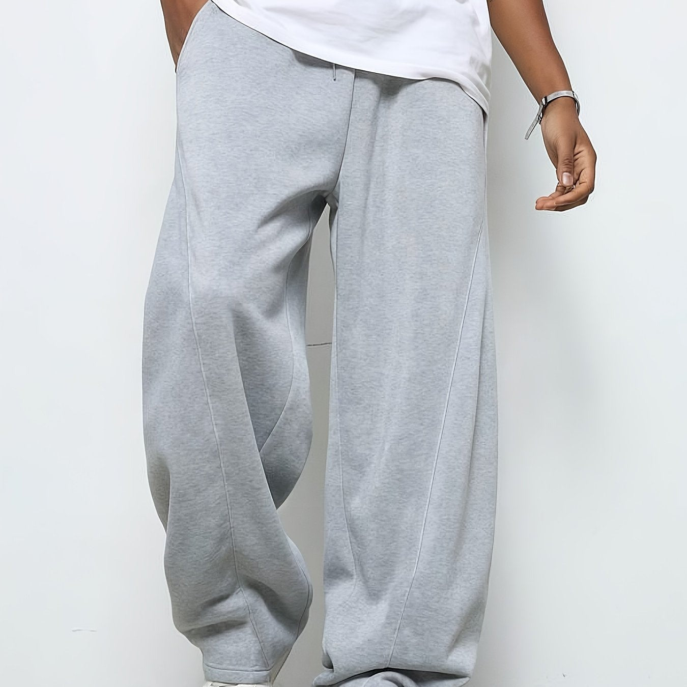 Man wearing gray baggy straight-leg fleece joggers with drawstring waist | Chaps London