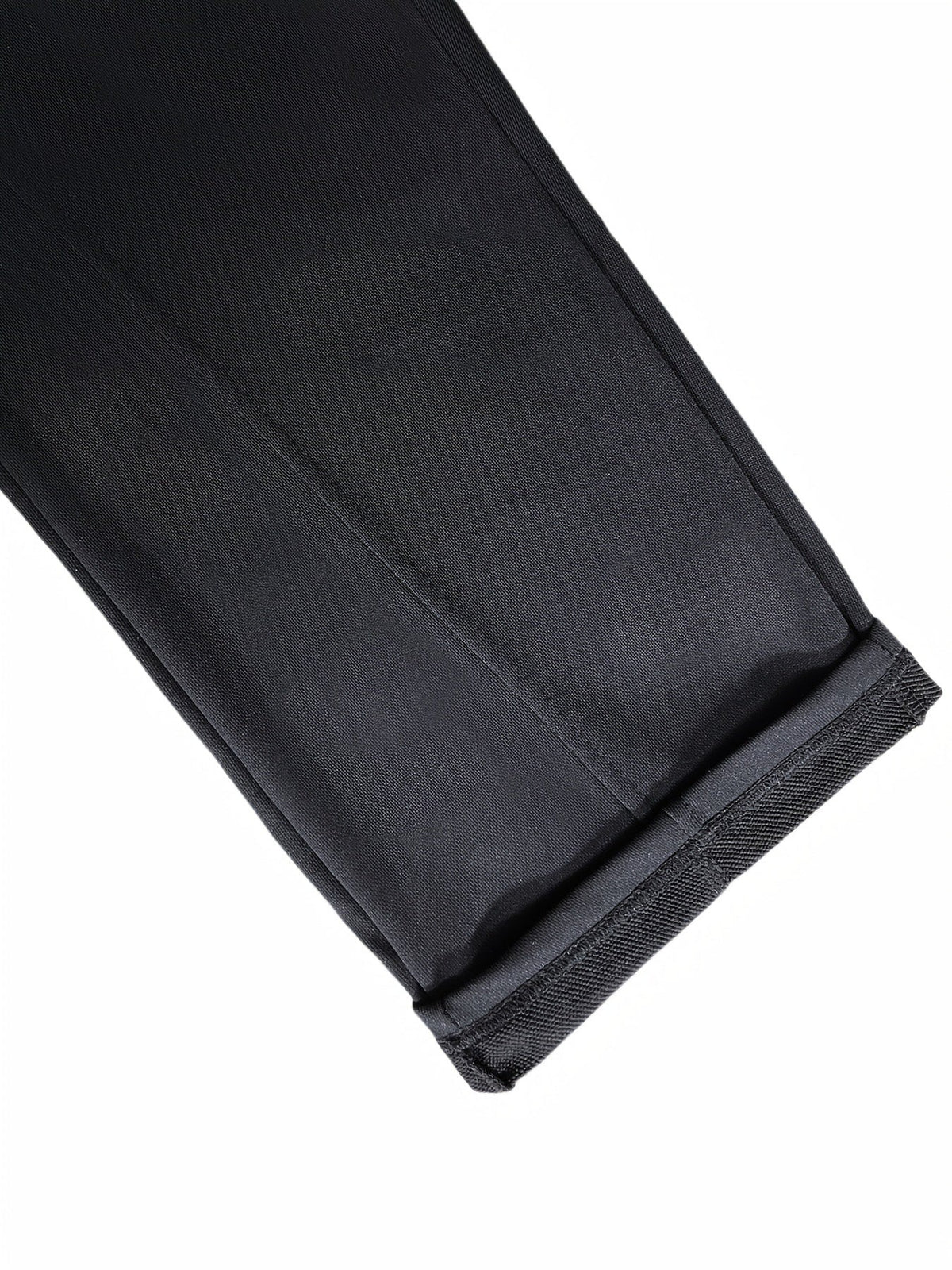 Black textured jogger cuff with ribbed hem, laid flat close-up view | Chaps London