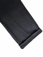 Black textured jogger cuff with ribbed hem, laid flat close-up view | Chaps London