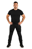 Man wearing black tactical cargo trousers with a black T-shirt, front view | Chaps London