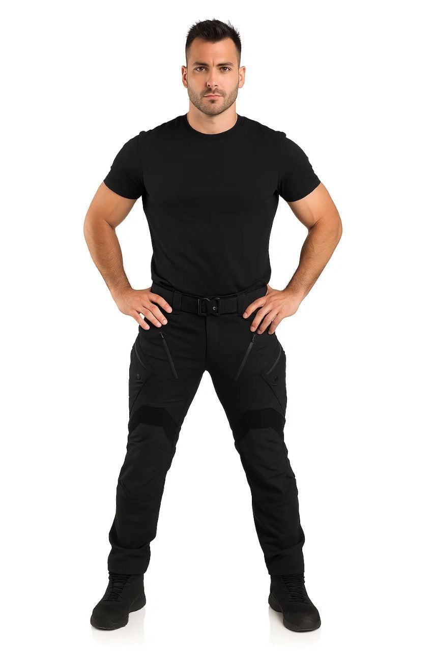 Man wearing black tactical cargo trousers with a black T-shirt, front view | Chaps London
