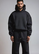 Men's black hoodie and joggers set, front view