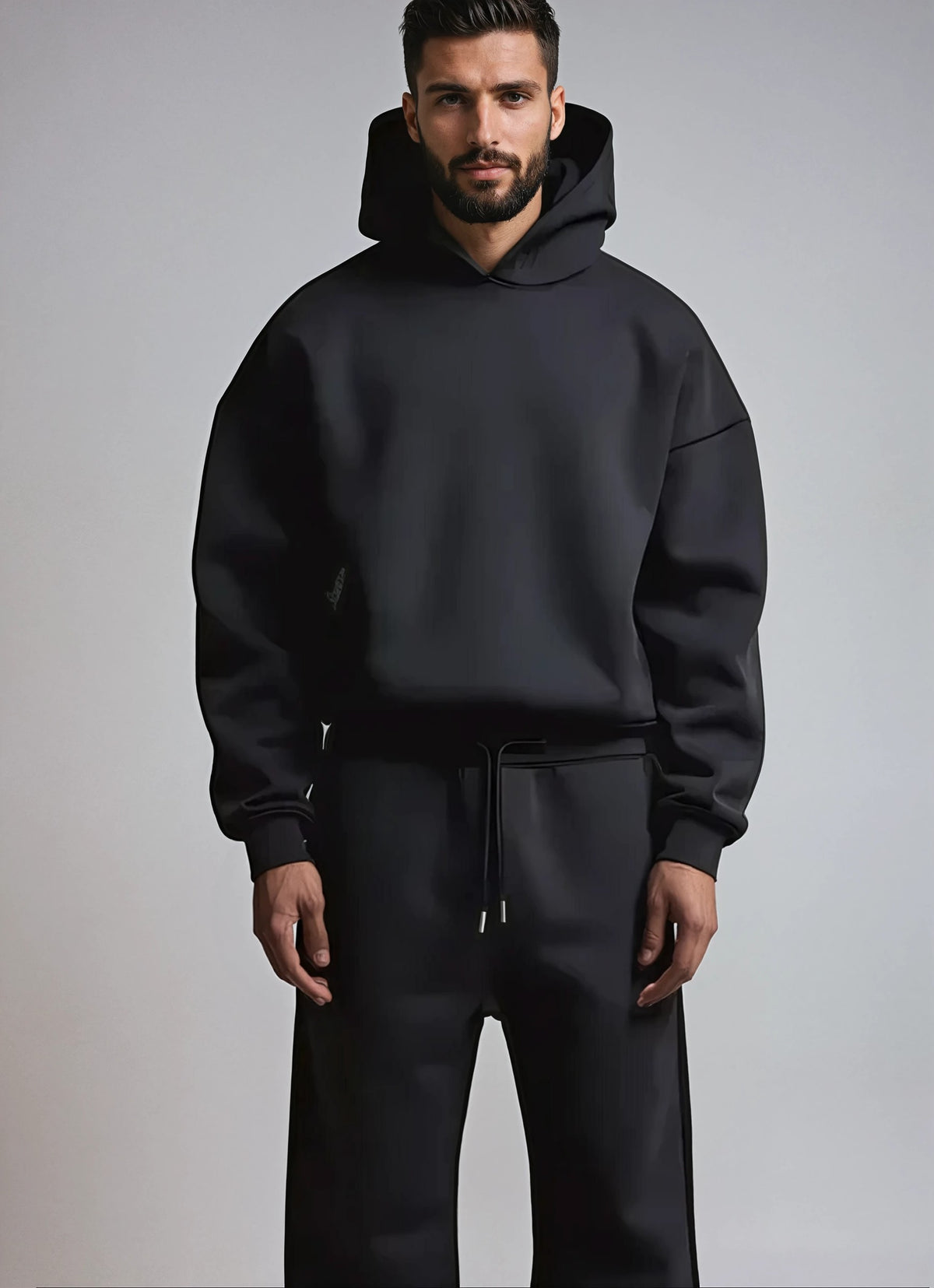 Men's black hoodie and joggers set, front view