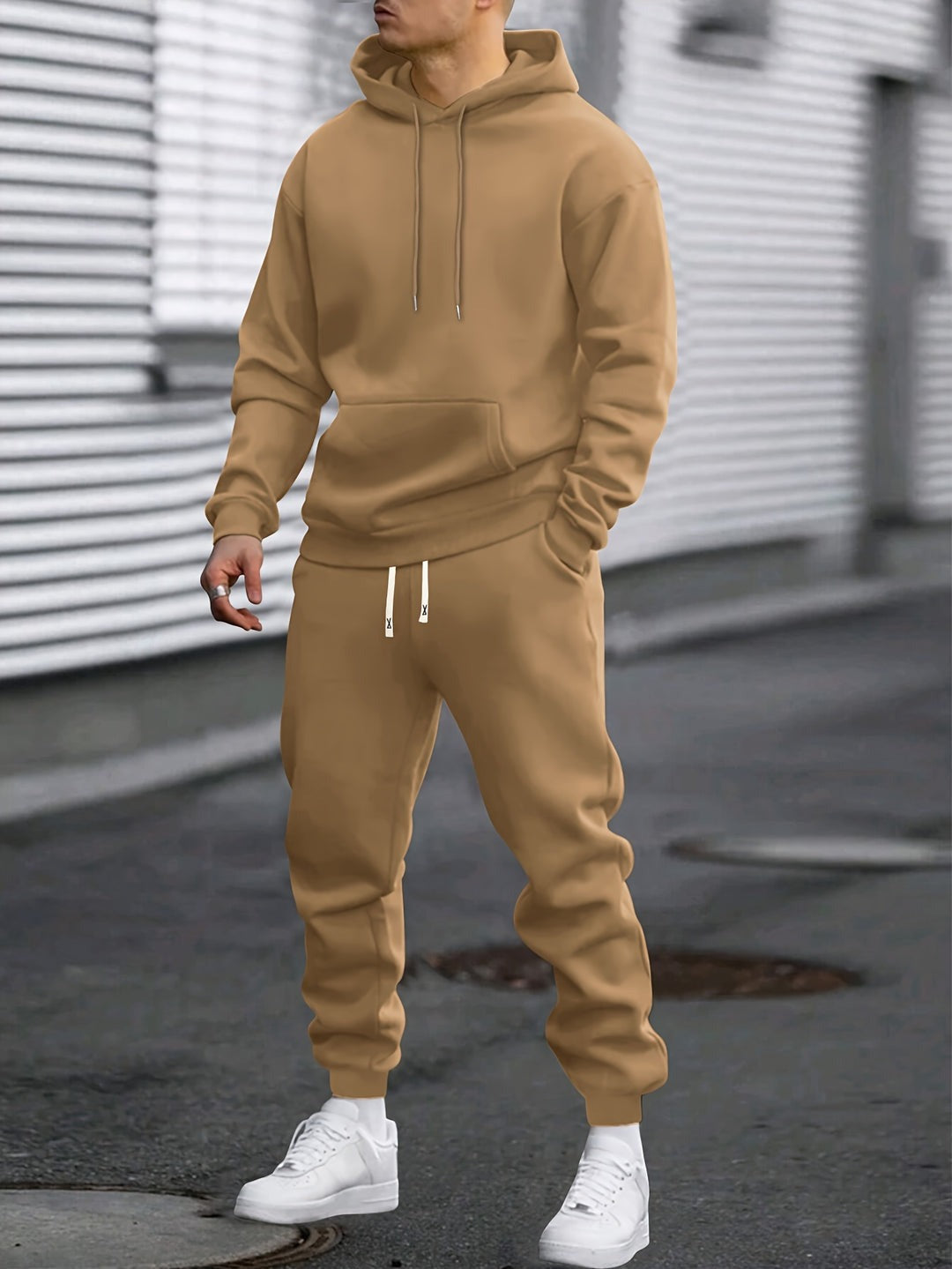 Man in a khaki hoodie and joggers tracksuit set | Chaps London