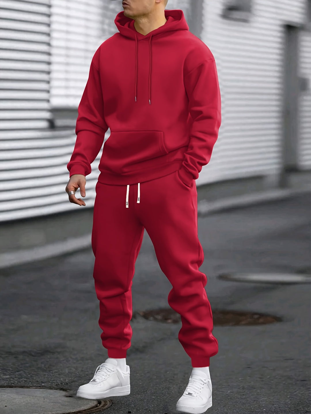 Man in a red hoodie and joggers tracksuit set | Chaps London