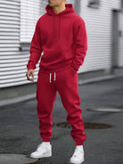 Man in a red hoodie and joggers tracksuit set | Chaps London