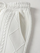 Close-up of the joggers' waistband, drawcord and side pocket with the cable pattern | Chaps London