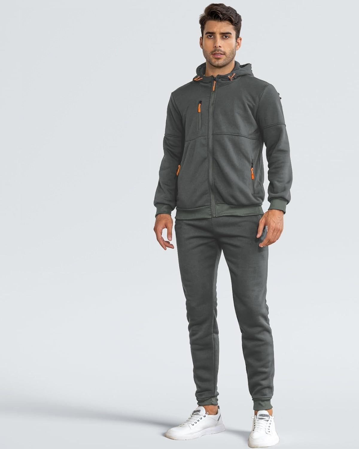 Man in a dark grey zip hoodie and joggers tracksuit, front view | Chaps London