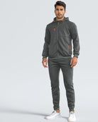 Man in a dark grey zip hoodie and joggers tracksuit, front view | Chaps London