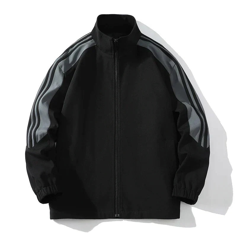 Black zip-up track jacket with gray striped sleeves, laid flat | Chaps London