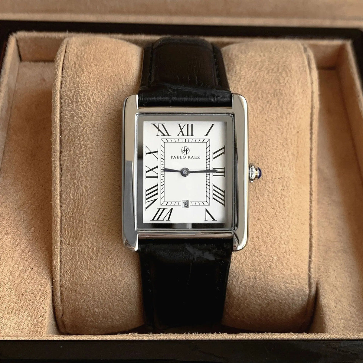 Men's rectangular watch with a silver-tone case, Roman numerals and a black leather strap